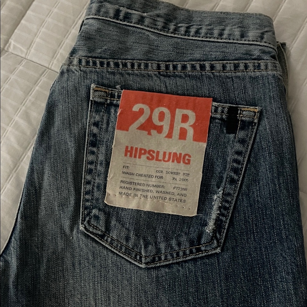 Women’s Blue Jeans size 29. Low rise and distressed.